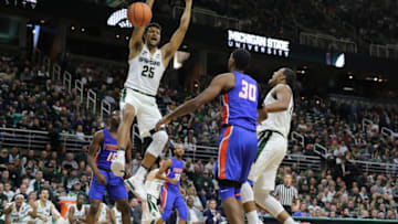 EAST LANSING, MI - DECEMBER 31: Kenny Goins #25 of the Michigan State Spartans dunks the ball against the Savannah State Tigers at Breslin Center on December 31, 2017 in East Lansing, Michigan. (Photo by Rey Del Rio/Getty Images)