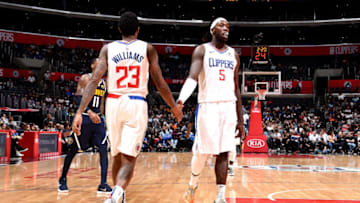 LOS ANGELES, CA - OCTOBER 9: Montrezl Harrell #5 of the LA Clippers shakes hands with Lou Williams #23 of the LA Clippers against the Denver Nuggets during a pre-season game on October 9, 2018 at Staples Center in Los Angeles, California. NOTE TO USER: User expressly acknowledges and agrees that, by downloading and/or using this photograph, User is consenting to the terms and conditions of the Getty Images License Agreement. Mandatory Copyright Notice: Copyright 2018 NBAE (Photo by Adam Pantozzi/NBAE via Getty Images)