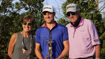 PONTE VEDRA BEACH, FLORIDA - MARCH 14: Justin Thomas of the United States celebrates with his mother Jani and father Mike after winning during the final round of THE PLAYERS Championship on THE PLAYERS Stadium Course at TPC Sawgrass on March 14, 2021 in Ponte Vedra Beach, Florida. (Photo by Sam Greenwood/Getty Images)
