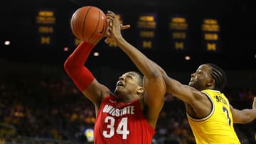 ANN ARBOR, MICHIGAN - JANUARY 29: Zavier Simpson #3 of the Michigan Wolverines blocks the shot of Kaleb Wesson #34 of the Ohio State Buckeyes during the second half at Crisler Arena on January 29, 2019 in Ann Arbor, Michigan. Michigan won the game 65-49.(Photo by Gregory Shamus/Getty Images)