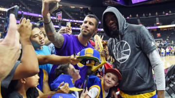 LAS VEGAS, NV - OCTOBER 15: Kevin Durant #35 of the Golden State Warriors poses for selfies with fans before a preseason game against the Los Angeles Lakers at T-Mobile Arena on October 15, 2016 in Las Vegas, Nevada. NOTE TO USER: User expressly acknowledges and agrees that, by downloading and or using this photograph, User is consenting to the terms and conditions of the Getty Images License Agreement. (Photo by Ethan Miller/Getty Images)