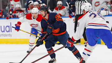 Mar 5, 2022; Edmonton, Alberta, CAN; Edmonton Oilers forward Kailer Yamamoto (56) looks to make a pass in front of Montreal Canadiens defensemen Jeff Petry (26) during the first period at Rogers Place. Mandatory Credit: Perry Nelson-USA TODAY Sports