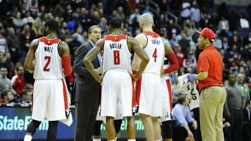 Mar 27, 2015; Washington, DC, USA; Washington Wizards head coach Randy Wittman talks to the team against the Charlotte Hornets during overtime at Verizon Center. The Wizards won in double overtime 110 - 107. Mandatory Credit: Brad Mills-USA TODAY Sports