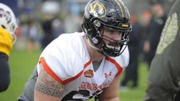 Jan 26, 2016; Fairhope, AL, USA; South squad offensive guard Connor McGovern of Missouri (60) blocks during Senior Bowl practice at Fairhope Stadium. Mandatory Credit: Glenn Andrews-USA TODAY Sports