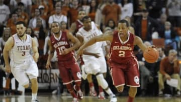 Jan 5, 2015; Austin, TX, USA; Oklahoma Sooners guard Dinjiyl Walker (2) leads a fast break against the Texas Longhorns during the second half at the Frank Erwin Special Events Center. Oklahoma beat Texas 70-49. Mandatory Credit: Brendan Maloney-USA TODAY Sports