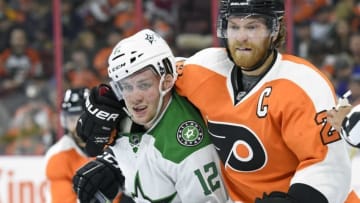 Oct 20, 2015; Philadelphia, PA, USA; Philadelphia Flyers center Claude Giroux (28) and Dallas Stars center Radek Faksa (12) battle during the first period at Wells Fargo Center. Mandatory Credit: Eric Hartline-USA TODAY Sports