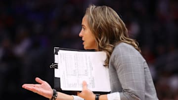 DETROIT, MICHIGAN - DECEMBER 01: Assistant coach Becky Hammon reacts from the bench while playing the Detroit Pistons at Little Caesars Arena on December 01, 2019 in Detroit, Michigan. Detroit won the game 132-98. NOTE TO USER: User expressly acknowledges and agrees that, by downloading and or using this photograph, User is consenting to the terms and conditions of the Getty Images License Agreement. (Photo by Gregory Shamus/Getty Images)