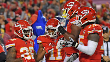 KANSAS CITY, MO - OCTOBER 27: Running back Damien Williams #26 of the Kansas City Chiefs celebrates with his teammates after scoring a touchdown against the Green Bay Packers during the second half at Arrowhead Stadium on October 27, 2019 in Kansas City, Missouri. (Photo by Peter Aiken/Getty Images)