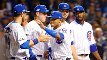 Oct 7, 2016; Chicago, IL, USA; Chicago Cubs shortstop Addison Russell (27) high fives left fielder Ben Zobrist (18) as the lineup is announced before game one of the 2016 NLDS playoff baseball series at Wrigley Field. Mandatory Credit: Jerry Lai-USA TODAY Sports