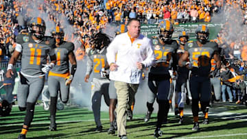 NASHVILLE, TN - DECEMBER 30: Head coach Butch Jones and quarterback Joshua Dobbs