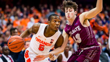 SYRACUSE, NY - NOVEMBER 21: Jalen Carey #5 of the Syracuse Orange drives to the basket against Jack Ferguson #13 of the Colgate Raiders during the second half at the Carrier Dome on November 21, 2018 in Syracuse, New York. (Photo by Brett Carlsen/Getty Images)