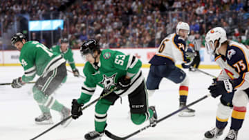 DENVER, COLORADO - NOVEMBER 26: Wyatt Johnston #53 of the Dallas Stars looks for an opening against the Colorado Avalanche in the third period at Ball Arena on November 26, 2022 in Denver, Colorado. (Photo by Matthew Stockman/Getty Images)