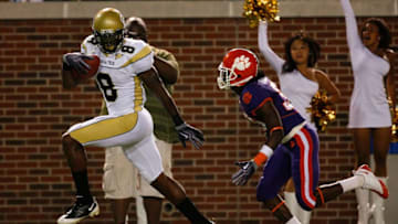 ATLANTA - SEPTEMBER 10: Demaryius Thomas #8 of the Georgia Tech Yellow Jackets scores a touchdown on a fake field goal against Chris Chancellor #38 of the Clemson Tigers at Bobby Dodd Stadium on September 10, 2009 in Atlanta, Georgia. (Photo by Kevin C. Cox/Getty Images)