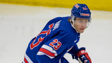PLYMOUTH, MI - JULY 27 Cross Hanas #23 of USA-Blue turns up ice against Finland during a World Junior Summer Showcase game two at USA Hockey Arena on July 27, 2021 in Plymouth, Michigan. (Photo by Dave Reginek/Getty Images)