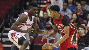 Dec 2, 2015; Houston, TX, USA; New Orleans Pelicans forward Anthony Davis (23) drives to the basket as Houston Rockets center Clint Capela (15) defends during the first quarter at Toyota Center. Mandatory Credit: Troy Taormina-USA TODAY Sports