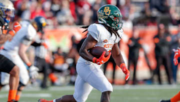 MOBILE, AL - JANUARY 25: Runningback JaMycal Hasty #23 from Baylor of the North Team on a running play during the 2020 Resse's Senior Bowl at Ladd-Peebles Stadium on January 25, 2020 in Mobile, Alabama. The North Team defeated the South Team 34 to 17. (Photo by Don Juan Moore/Getty Images)