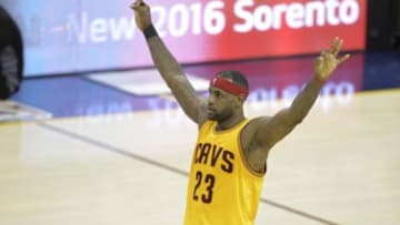 Feb 8, 2015; Cleveland, OH, USA; Cleveland Cavaliers forward LeBron James (23) celebrates on the court in the second quarter against the Los Angeles Lakers at Quicken Loans Arena. Mandatory Credit: David Richard-USA TODAY Sports
