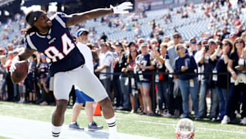 FOXBOROUGH, MA - SEPTEMBER 30: Cordarrelle Patterson #84 of the New England Patriots throws a football into the stands to fans before the game against the Miami Dolphins at Gillette Stadium on September 30, 2018 in Foxborough, Massachusetts. (Photo by Maddie Meyer/Getty Images)