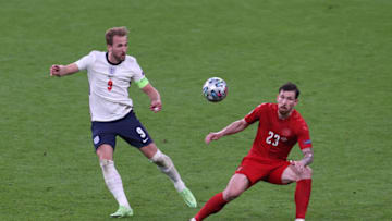 LONDON, ENGLAND - JULY 07: Pierre-Emile Hojbjerg of Denmark and Harry Kane of England battle for the ball during the UEFA Euro 2020 Championship Semi-final match between England and Denmark at Wembley Stadium on July 07, 2021 in London, England. (Photo by Catherine Ivill/Getty Images)