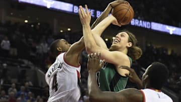 Mar 31, 2016; Portland, OR, USA; Portland Trail Blazers forward Maurice Harkless (4) blocks the shot of Boston Celtics center Kelly Olynyk (41) during the fourth quarter of the game at the Moda Center at the Rose Quarter. The Trail Blazers won 116-109. Mandatory Credit: Steve Dykes-USA TODAY Sports