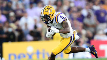 Auburn footballSep 4, 2021; Pasadena, California, USA; Louisiana State Tigers wide receiver Koy Moore (2) runs the ball against the UCLA Bruins during the first half the at the Rose Bowl. Mandatory Credit: Gary A. Vasquez-USA TODAY Sports
