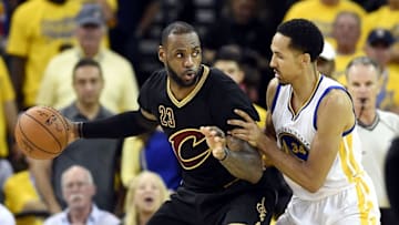 Jun 19, 2016; Oakland, CA, USA; Cleveland Cavaliers forward LeBron James (23) handles the ball against Golden State Warriors guard Shaun Livingston (34) during the third quarter in game seven of the NBA Finals at Oracle Arena. Mandatory Credit: Bob Donnan-USA TODAY Sports