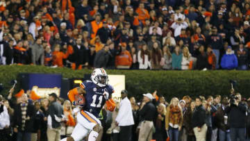 AUBURN, AL - NOVEMBER 30: Chris Davis #11 of the Auburn Tigers returns a missed field goal for the winning touchdown in their 34 to 28 win over the Alabama Crimson Tide at Jordan-Hare Stadium on November 30, 2013 in Auburn, Alabama. (Photo by Kevin C. Cox/Getty Images)