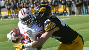 22 OCT 2016: Iowa Hawkeyes outside linebacker Ben Niemann (44) tackles Wisconsin running back Dare Dgunbowale (23) during a Big Ten Conference football game between the Wisconsin Badgers and the Iowa Hawkeyes at Kinnick Stadium in Iowa City, Iowa. (Photo by Keith Gillett/Icon Sportswire via Getty Images)