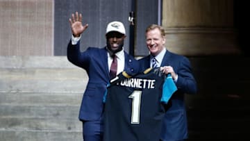 PHILADELPHIA, PA - APRIL 27: (L-R) Leonard Fournette of LSU poses with Commissioner of the National Football League Roger Goodell after being picked