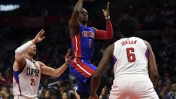 Nov 14, 2015; Los Angeles, CA, USA; Detroit Pistons guard Reggie Jackson (1) attempts a shot defended by Los Angeles Clippers guard Austin Rivers (25) in front of center DeAndre Jordan (6) during the first quarter at Staples Center. Mandatory Credit: Kelvin Kuo-USA TODAY Sports