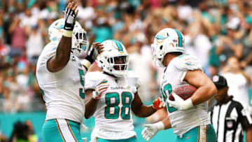 MIAMI GARDENS, FL - OCTOBER 22: Anthony Fasano #80 of the Miami Dolphins celebrates with Leonte Carroo #88 of the Miami Dolphins after scoring a touchdown during the second quarter against the New York Jets at Hard Rock Stadium on October 22, 2017 in Miami Gardens, Florida. (Photo by Rob Foldy/Getty Images)