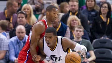 Oct 17, 2016; Salt Lake City, UT, USA; Los Angeles Clippers forward Wesley Johnson (33) defends against Utah Jazz forward Joe Johnson (6) during the first half at Vivint Smart Home Arena. The Jazz won 104-78. Mandatory Credit: Russ Isabella-USA TODAY Sports