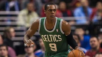 Feb 5, 2014; Philadelphia, PA, USA; Boston Celtics guard Rajon Rondo (9) brings the ball up court during the third quarter against the Philadelphia 76ers at the Wells Fargo Center. The Celtics defeated the Sixers 114-108. Mandatory Credit: Howard Smith-USA TODAY Sports