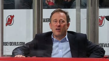 New Jersey Devils owner Joshua Harris takes in the game between the Devils and the Chicago Blackhawks at the Prudential Center on December 9, 2014 in Newark, New Jersey. The Blackhawks defeated the Devils 3-2 in the shootout. (Photo by Bruce Bennett/Getty Images)