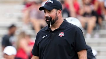 Sep 2, 2023; Bloomington, Indiana, USA; Ohio State Buckeyes head coach Ryan Day leads warm ups prior to the NCAA football game at Indiana University Memorial Stadium. Ohio State won 23-3.