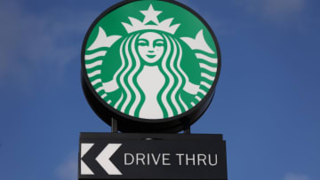 RUGELEY, ENGLAND - NOVEMBER 23: : The American Coffeehouse company, Starbucks logo is displayed outside one of its stores on November 23, 2022 in Rugeley, England. (Photo by Nathan Stirk/Getty Images)