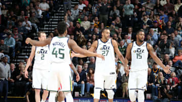 SALT LAKE CITY, UT - FEBRUARY 26: Rudy Gobert #27, Derrick Favors #15, and Donovan Mitchell #45 of the Utah Jazz high five during the game against the Houston Rockets on February 26, 2018 at vivint.SmartHome Arena in Salt Lake City, Utah. NOTE TO USER: User expressly acknowledges and agrees that, by downloading and or using this Photograph, User is consenting to the terms and conditions of the Getty Images License Agreement. Mandatory Copyright Notice: Copyright 2018 NBAE (Photo by Melissa Majchrzak/NBAE via Getty Images)
