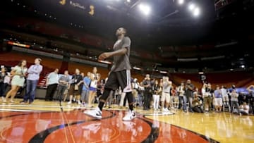 Jun 8, 2013; Miami, FL, USA; Miami Heat small forward LeBron James (6) is surrounded by media as he attempts half court shots at the end of practice for game two of the 2013 NBA Finals against the San Antonio Spurs at American Airlines Arena. Mandatory Credit: Derick E. Hingle-USA TODAY Sports