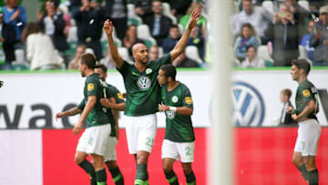 WOLFSBURG, GERMANY - AUGUST 25: John Anthony Brooks of Wolfsburg celebrates scoring his team's first goal during the Bundesliga match between VfL Wolfsburg and FC Schalke 04 at Volkswagen Arena on August 25, 2018 in Wolfsburg, Germany. (Photo by Selim Sudheimer/Bongarts/Getty Images)