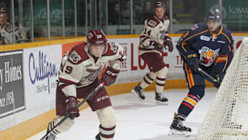 PETERBOROUGH, ON - NOVEMBER 4: Semyon Der-Arguchintsev #19 of the Peterborough Petes skates with the puck against the Barrie Colts during an OHL game at the Peterborough Memorial Centre on November 4, 2017 in Peterborough, Ontario, Canada. (Photo by Claus Andersen/Getty Images)