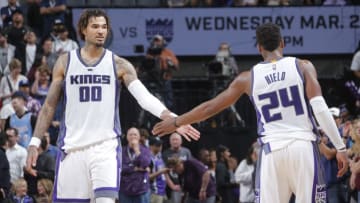 SACRAMENTO, CA - MARCH 13: Willie Cauley-Stein #00 and Buddy Hield #24 of the Sacramento Kings high five during the game against the Orlando Magic on March 13, 2017 at Golden 1 Center in Sacramento, California. NOTE TO USER: User expressly acknowledges and agrees that, by downloading and or using this photograph, User is consenting to the terms and conditions of the Getty Images Agreement. Mandatory Copyright Notice: Copyright 2017 NBAE (Photo by Rocky Widner/NBAE via Getty Images)