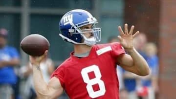 Jul 28, 2013; East Rutherford, NJ, USA; New York Giants quarterback David Carr (8) throws pass during training camp at the Quest Diagnostic Training Center. Mandatory Credit: Jim O