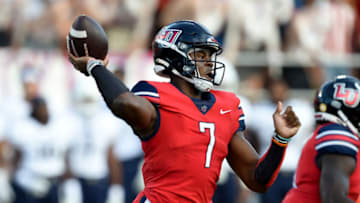 Denver Broncos mock draft: Malik Willis #7 of the Liberty Flames throws a pass against the Old Dominion Monarchs at Williams Stadium on September 18, 2021 in Lynchburg, Virginia. (Photo by G Fiume/Getty Images)