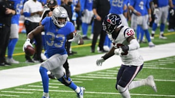 Auburn footballNov 26, 2020; Detroit, Michigan, USA; Detroit Lions running back Kerryon Johnson (33) runs the ball as Houston Texans linebacker Tyrell Adams (50) pursues during the second quarter at Ford Field. Mandatory Credit: Tim Fuller-USA TODAY Sports