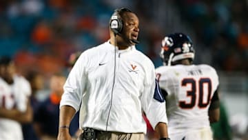 Nov 7, 2015; Miami Gardens, FL, USA; Virginia Cavaliers head coach Mike London looks on from the sideline during the second half against the Miami Hurricanes at Sun Life Stadium. Mandatory Credit: Steve Mitchell-USA TODAY Sports