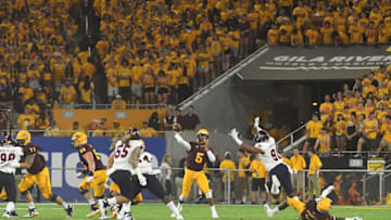 TEMPE, AZ - SEPTEMBER 01: Quarterback Manny Wilkins #5 of the Arizona State Sun Devils makes a pass in the first half against the UTSA Roadrunners at Sun Devil Stadium on September 1, 2018 in Tempe, Arizona. (Photo by Jennifer Stewart/Getty Images)