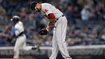 Sep 27, 2016; Bronx, NY, USA; Boston Red Sox starting pitcher David Price (24) reacts after giving up a solo home run to New York Yankees shortstop Didi Gregorius (18) during the sixth inning at Yankee Stadium. Mandatory Credit: Adam Hunger-USA TODAY Sports