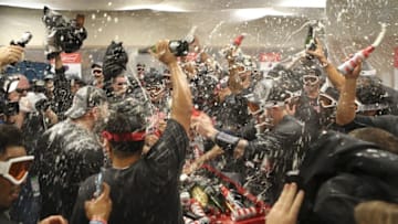 Sep 26, 2016; Detroit, MI, USA; Cleveland Indians celebrate clinching the Central Division title in the clubhouse after the game against the Detroit Tigers at Comerica Park. Indians win 7-4. Mandatory Credit: Raj Mehta-USA TODAY Sports