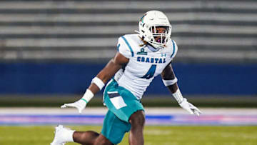 Sep 12, 2020; Lawrence, Kansas, USA; Coastal Carolina Chanticleers linebacker Kendricks Gladney (4) celebrates after a play against the Kansas Jayhawks during the second half at David Booth Kansas Memorial Stadium. Mandatory Credit: Jay Biggerstaff-USA TODAY Sports