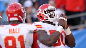 Nov 22, 2015; San Diego, CA, USA; Kansas City Chiefs outside linebacker Justin Houston (50) celebrates a touchdown he scored on an interception during the third quarter against the San Diego Chargers as outside linebacker Tamba Hali (91) looks on at Qualcomm Stadium. Mandatory Credit: Jake Roth-USA TODAY Sports